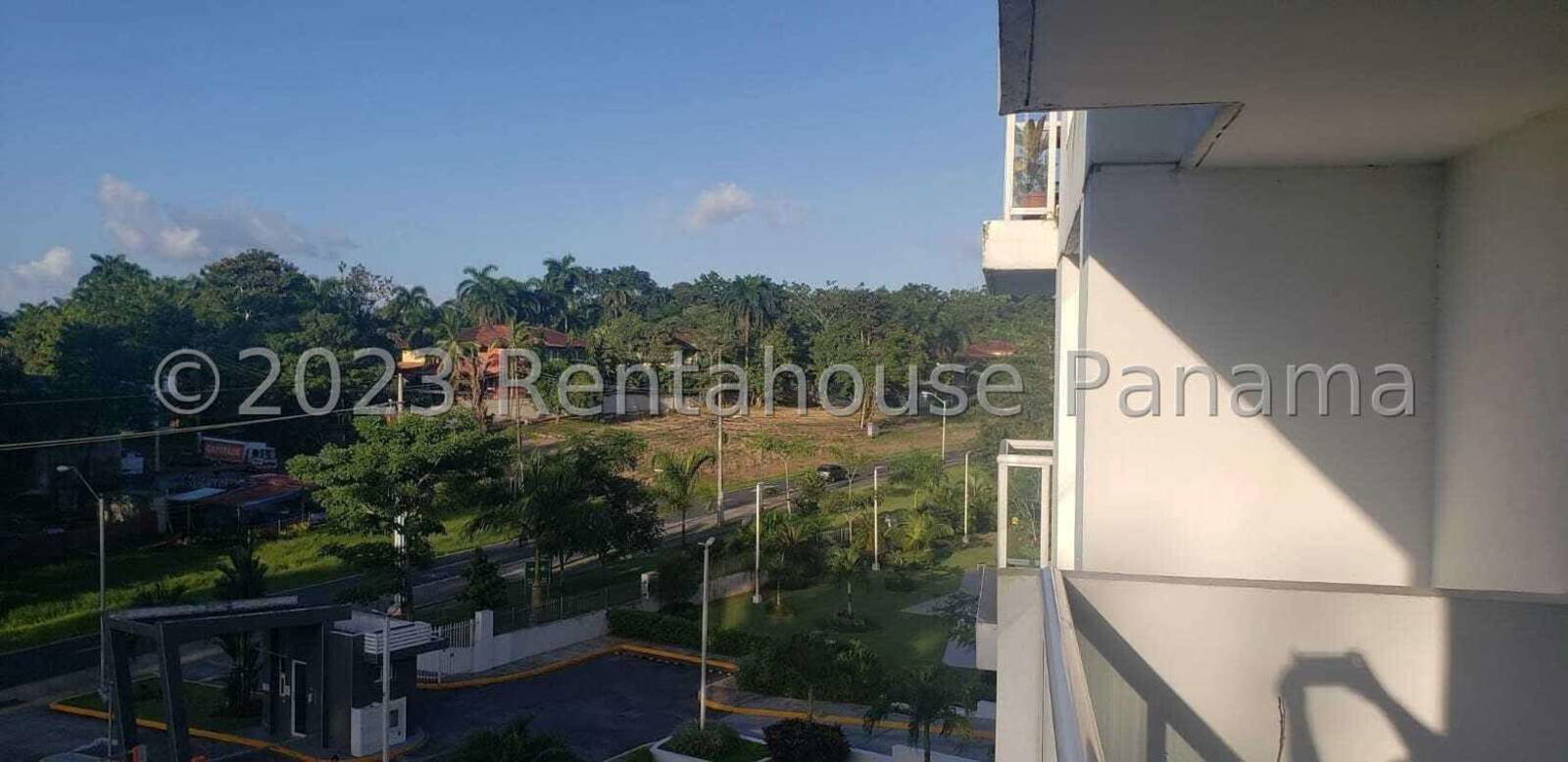 Private balcony overlooking lush greenery in PH Garden City Clayton Panama apartment for sale