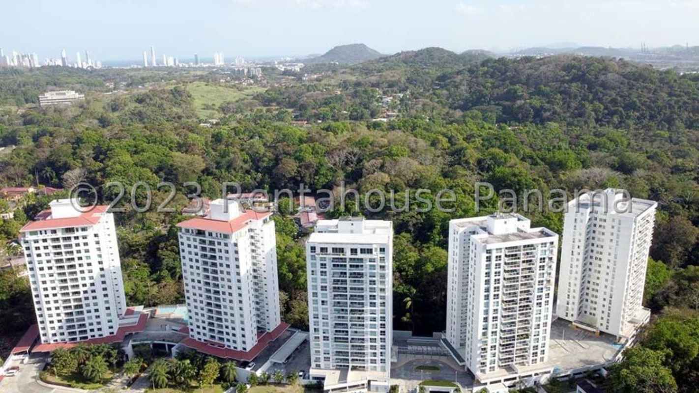 Aerial of PH Garden City Clayton surrounded by greenery and city skyline Panama