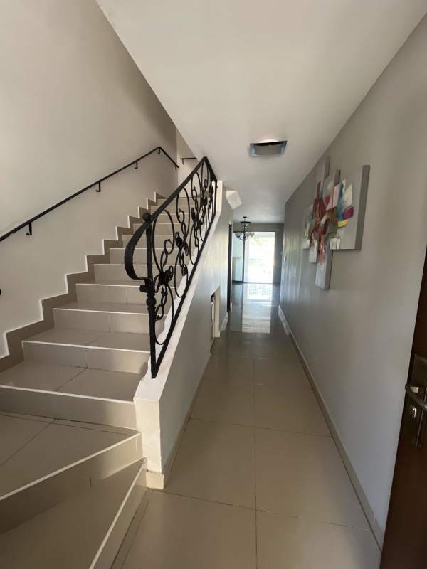 Spacious open living room with tiled floors, split AC, large windows in Green Village Milla 8 Panama