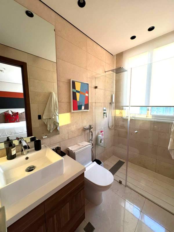Stylish bathroom with glass walk-in shower and large window at PH Wind Rose Coco del Mar
