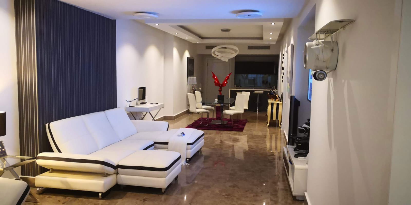 Contemporary living and dining room open plan with stylish decor in PH YOO Panama Avenida Balboa