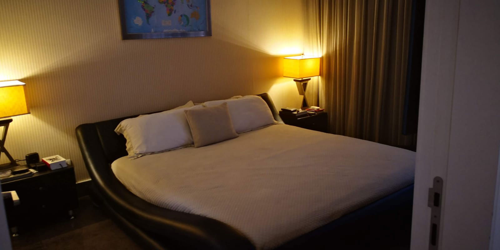 Spacious contemporary bedroom with city and sea views at PH YOO Panama luxury waterfront condo