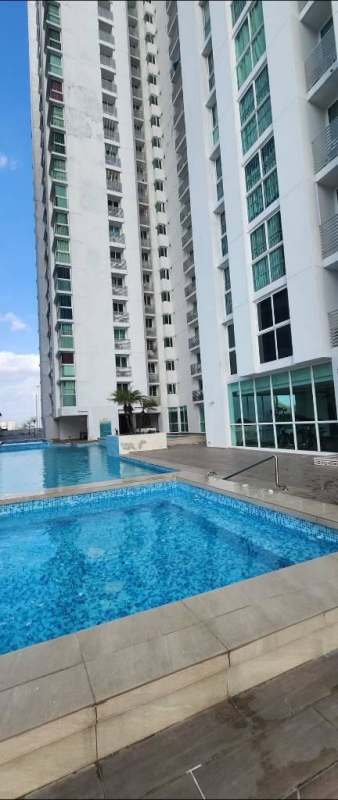 Condado del Rey apartments at PH Kings Park showing high-rise buildings and swimming pool