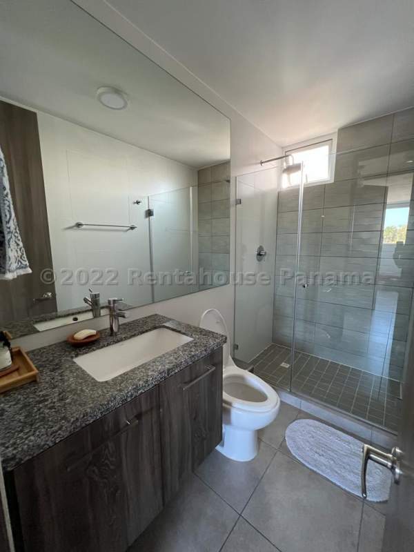 Kitchen with granite counters, cabinets and natural light PH Brisas del Golf Panama