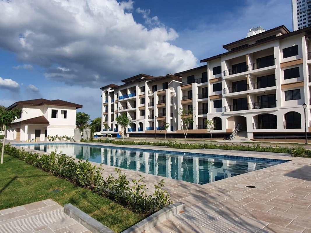 Modern bathroom double sink glass-enclosed shower in Casa Bianca Costa del Este apartment sale Panama