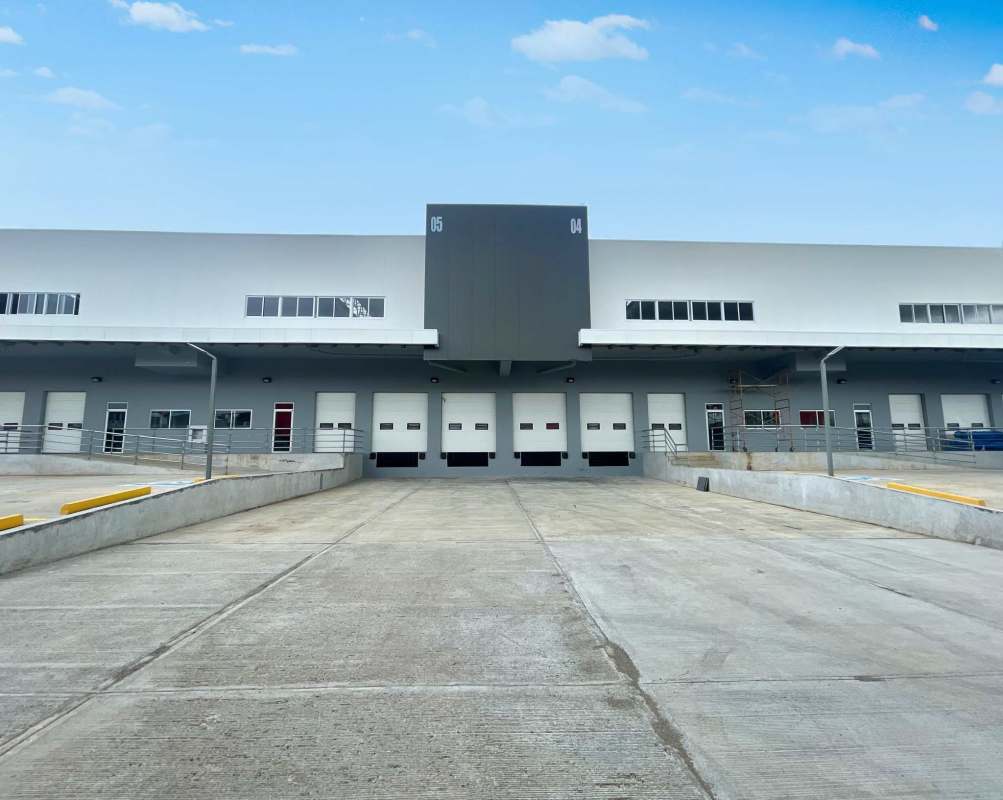 Large warehouse with dock-high doors and ample parking in South Park Don Bosco