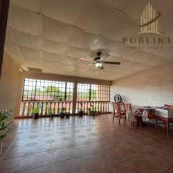 Facade with covered parking, gate, La Chorrera Mastranto Panama house for sale