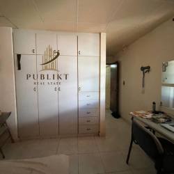 Large living area with bright windows at Mastranto house La Chorrera Panama for sale