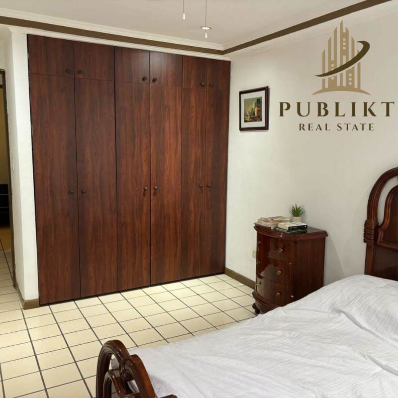 Traditional kitchen with granite countertops and wood cabinets Condado del Rey Panama