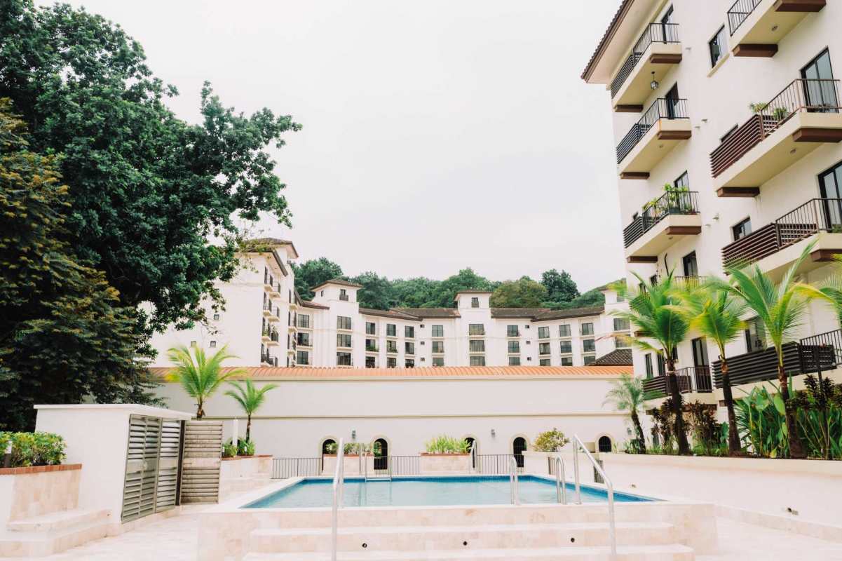 Spacious bedroom with large windows balcony door Embassy Village Clayton apartment for sale Panama