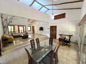 Interior open space with vaulted ceiling, dining & living area, glass doors to terrace Vista Alegre Panama