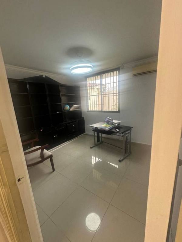 Bedroom with built-in closet, AC, ceiling fan in 4-bedroom rental home Panama City