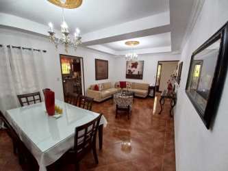 Fenced traditional bungalow with garden, gated driveway in Penonomé Panama