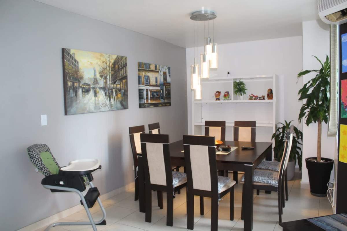 Bright living and dining area with AC, balcony access at PH 44 Park Panama