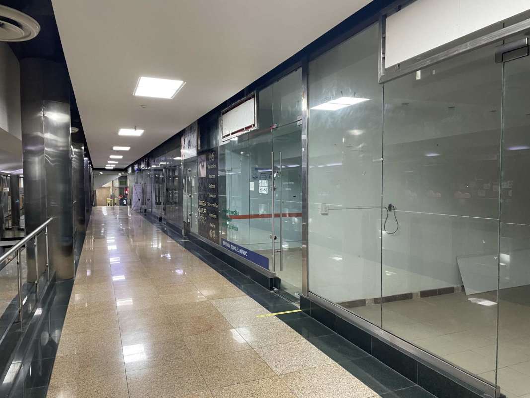 El Dorado Super Center mall corridor showing available retail units for lease in Panama City