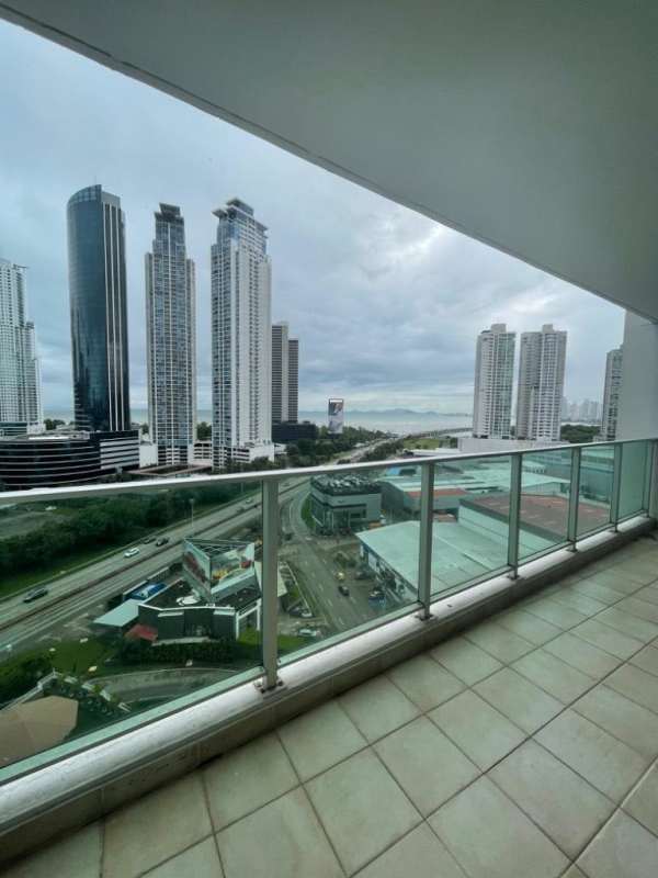 Dining area with large glass windows and skyline views PH Sevilla Panama