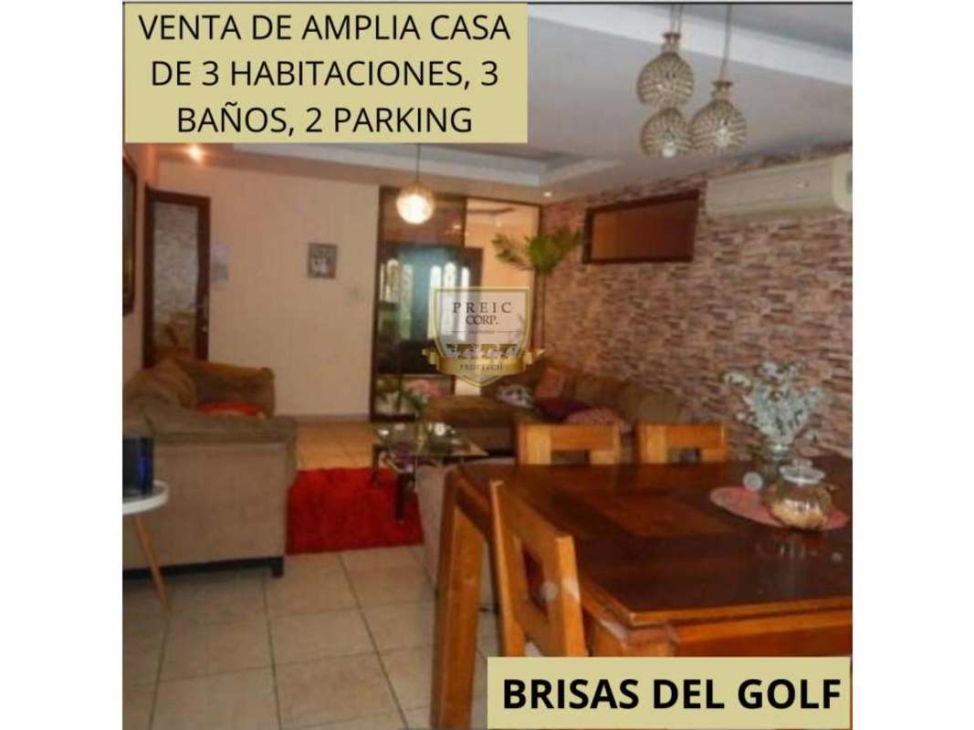 Spacious living dining combo with stone accent wall and neutral tiles Brisas del Golf house for sale