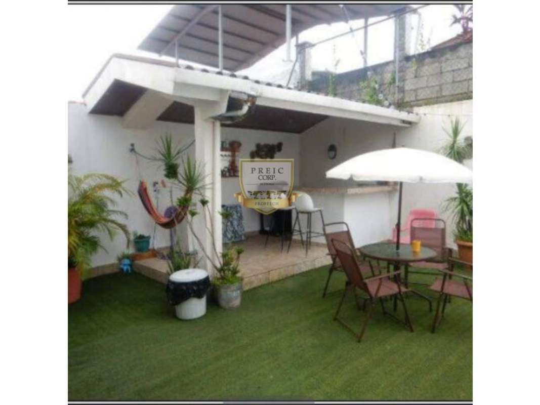 Functional kitchen with white cabinets stove window and pantry Brisas del Golf Panama