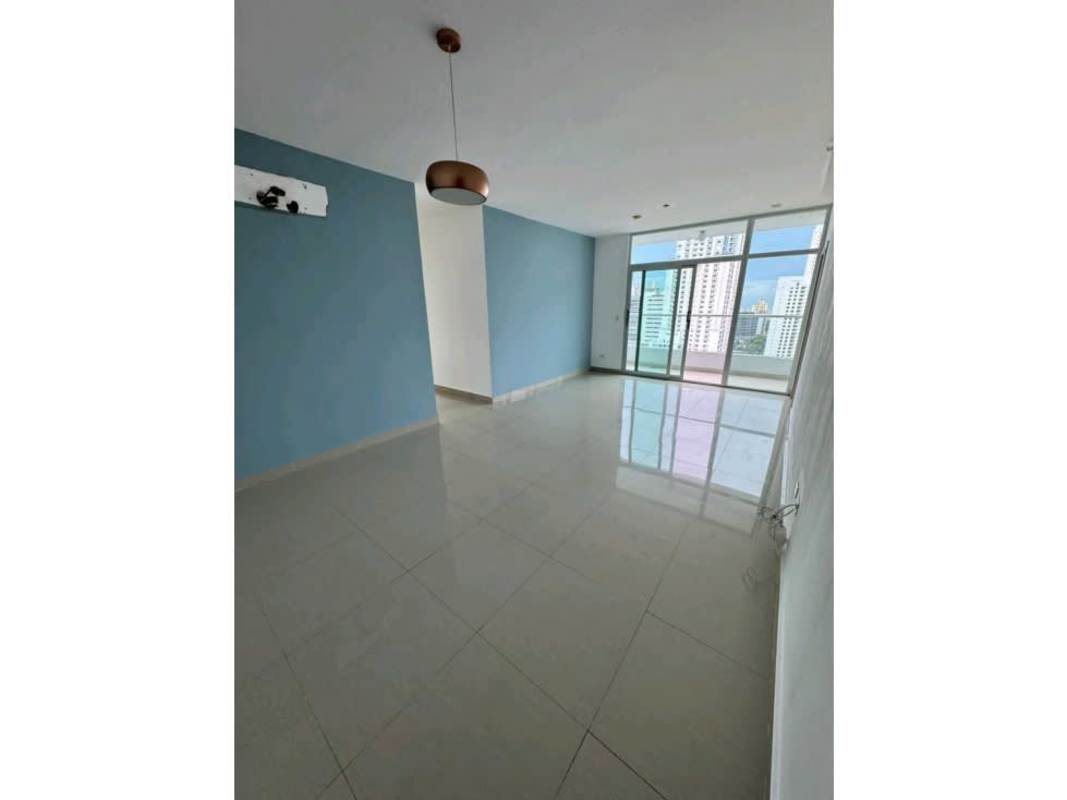 Bedroom with large window overlooking Panama City skyline at PH San Francisco Bay