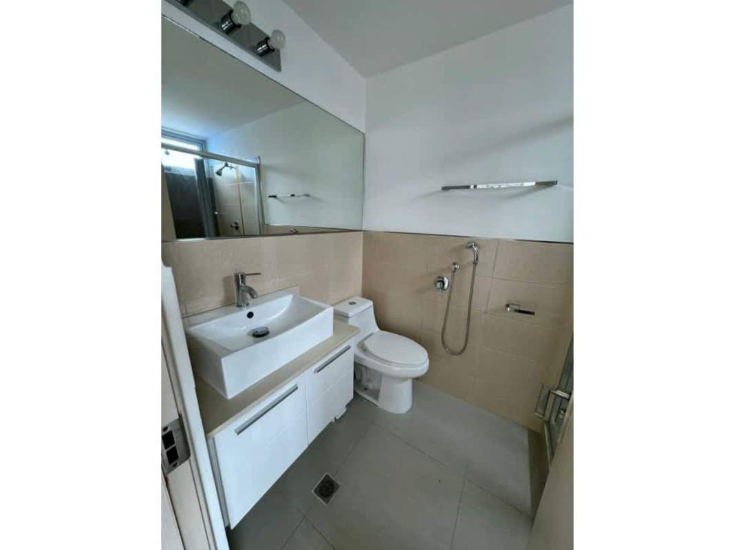 Kitchen with granite countertops appliances and city view window PH San Francisco Bay Panama