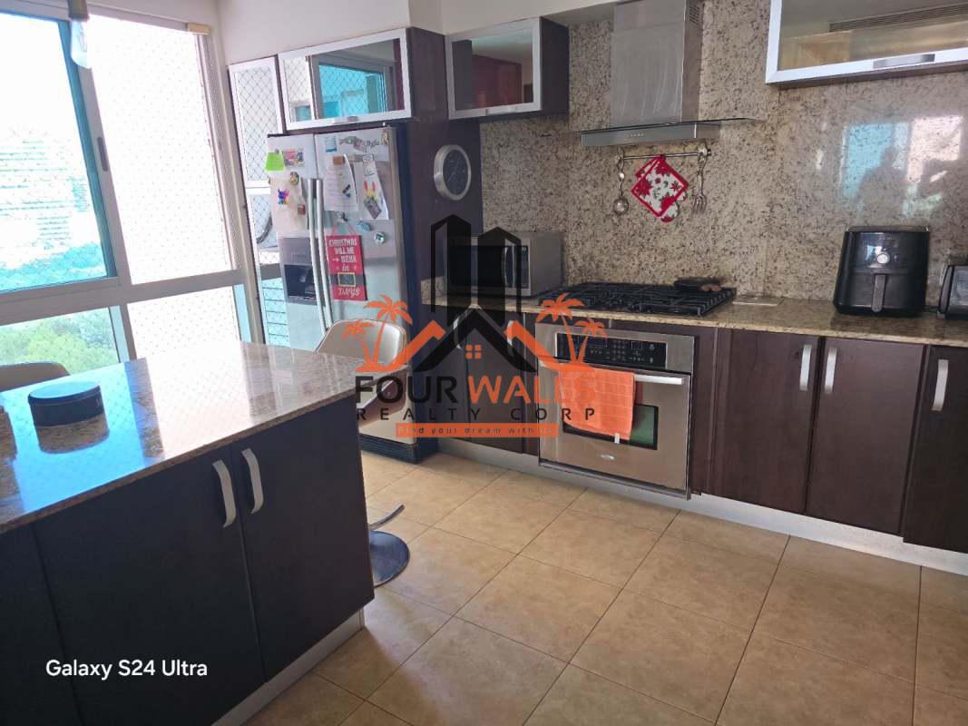 Luxury kitchen with granite countertops, stainless steel appliances PH Titanium Panama