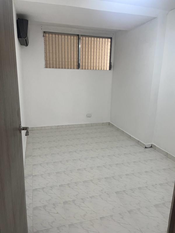 Minimalist bedroom tile floor AC security bars PH Plaza Bella Vista Bella Vista Panama