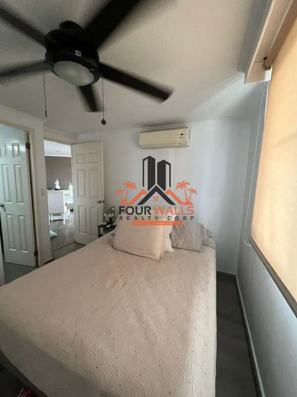 Facade of PH Llano Bonito Juan Díaz with parking and green areas