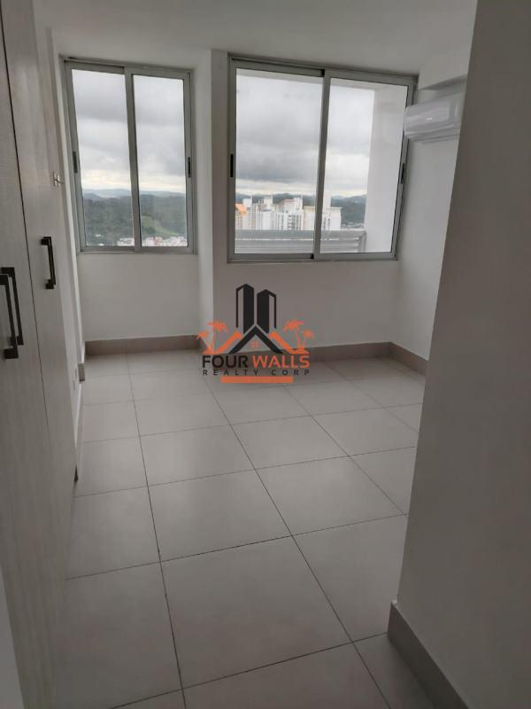 Bright living and dining room with city and mountain views in PH Skypoint Tower Panama