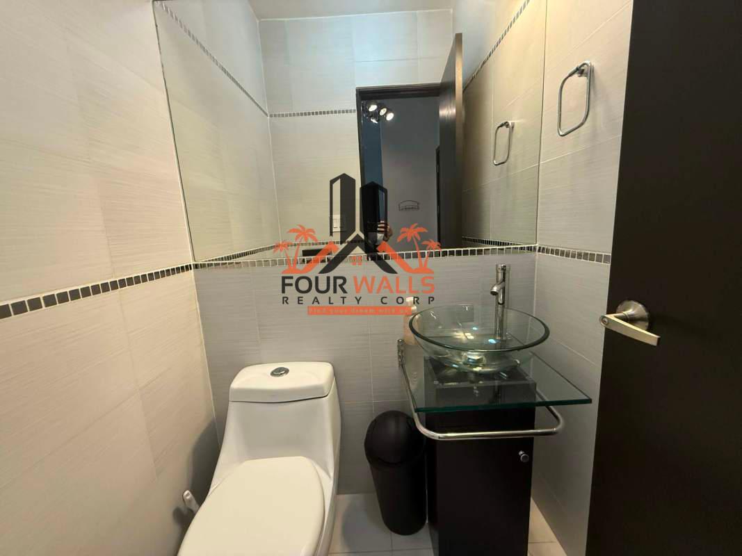 Modern gym with cardio and weight equipment in PH Quadrat Punta Pacífica Panama