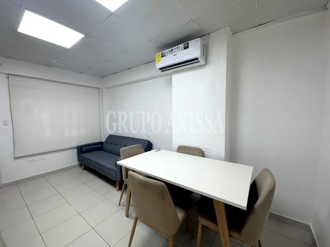Bright living dining area with AC in fully furnished studio Ancón Panama