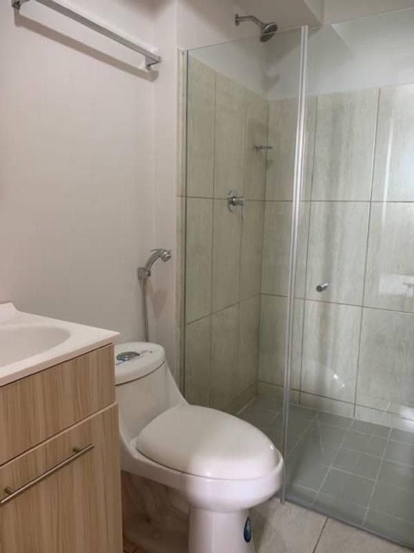 Compact modern kitchen stove refrigerator window with green view PH Bella Natura Panama