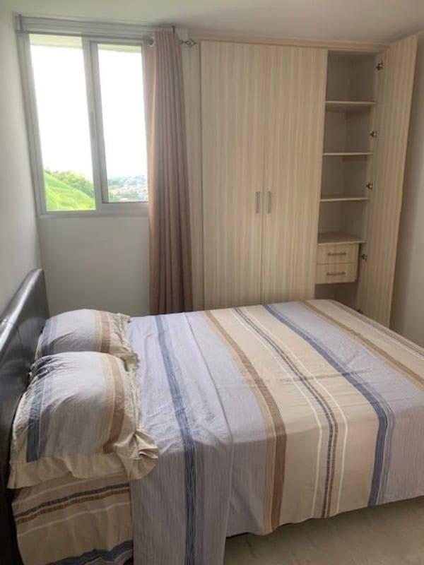 Contemporary bathroom with glass shower enclosure, beige tiles PH Bella Natura Panama