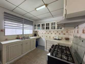 Bedroom with wood wardrobe, curtains, tiled floor for sale in Chitré Herrera Panama