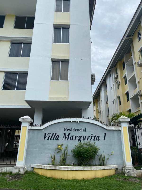 Exterior multi-story building PH Villa Margarita with gated entrance in Parque Lefevre Panama City