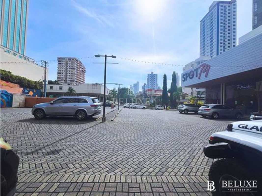 Parking lot and facade of commercial plaza in San Francisco Panama City