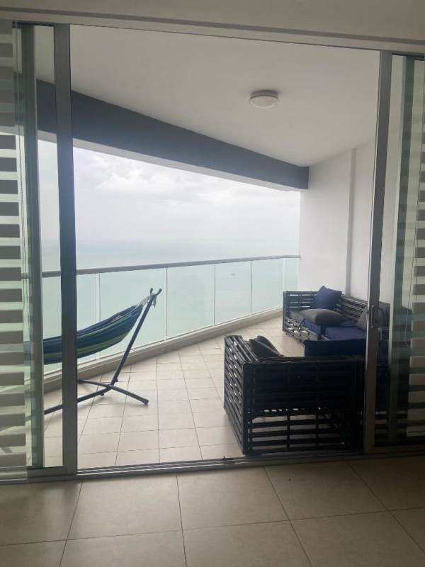 Oceanfront balcony with hammock, patio seating, panoramic sea view in Rivage Tower Punta Paitilla