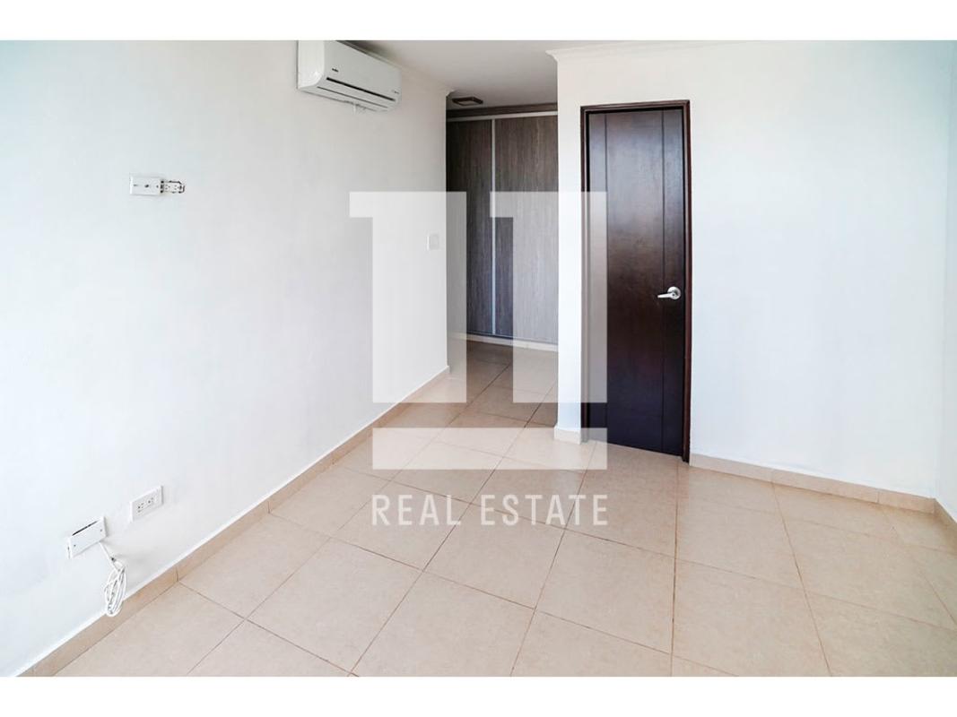 Bedroom with built-in wardrobe and security mesh window PH Sol del Este Costa del Este Panama