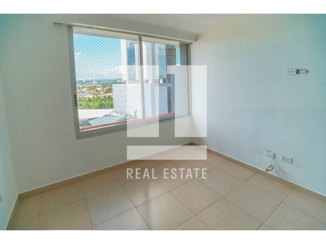 Minimalist bedroom with large window city view PH Sol del Este Costa del Este Panama