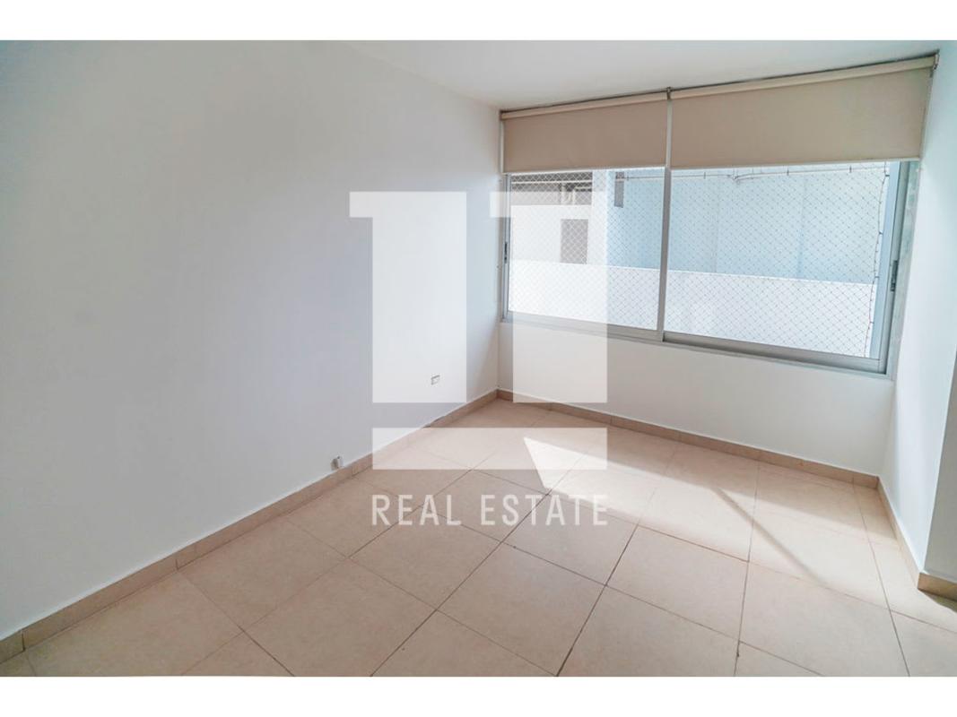 Bedroom with big window beige blinds PH Sol del Este Costa del Este Panama City