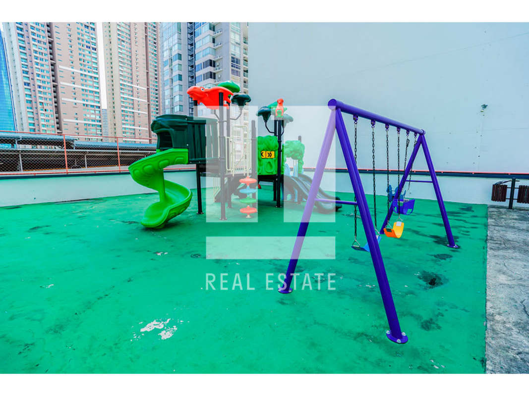 Rooftop play zone swings slides with skyline views Sol del Este Costa del Este Panama