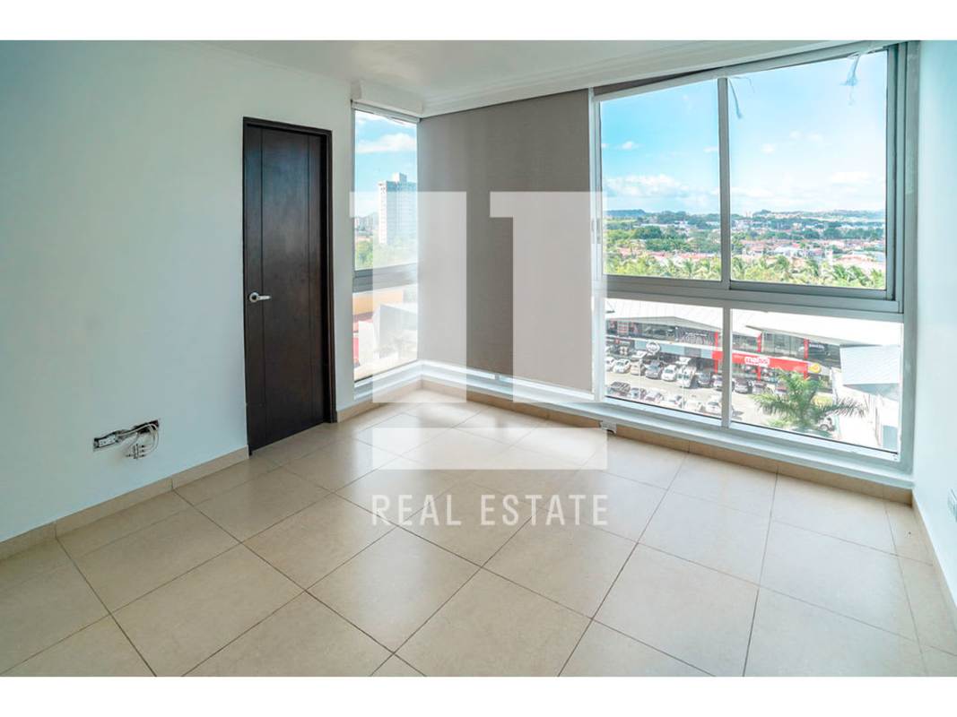 Bright bedroom with large windows city skyline view PH Sol del Este Costa del Este