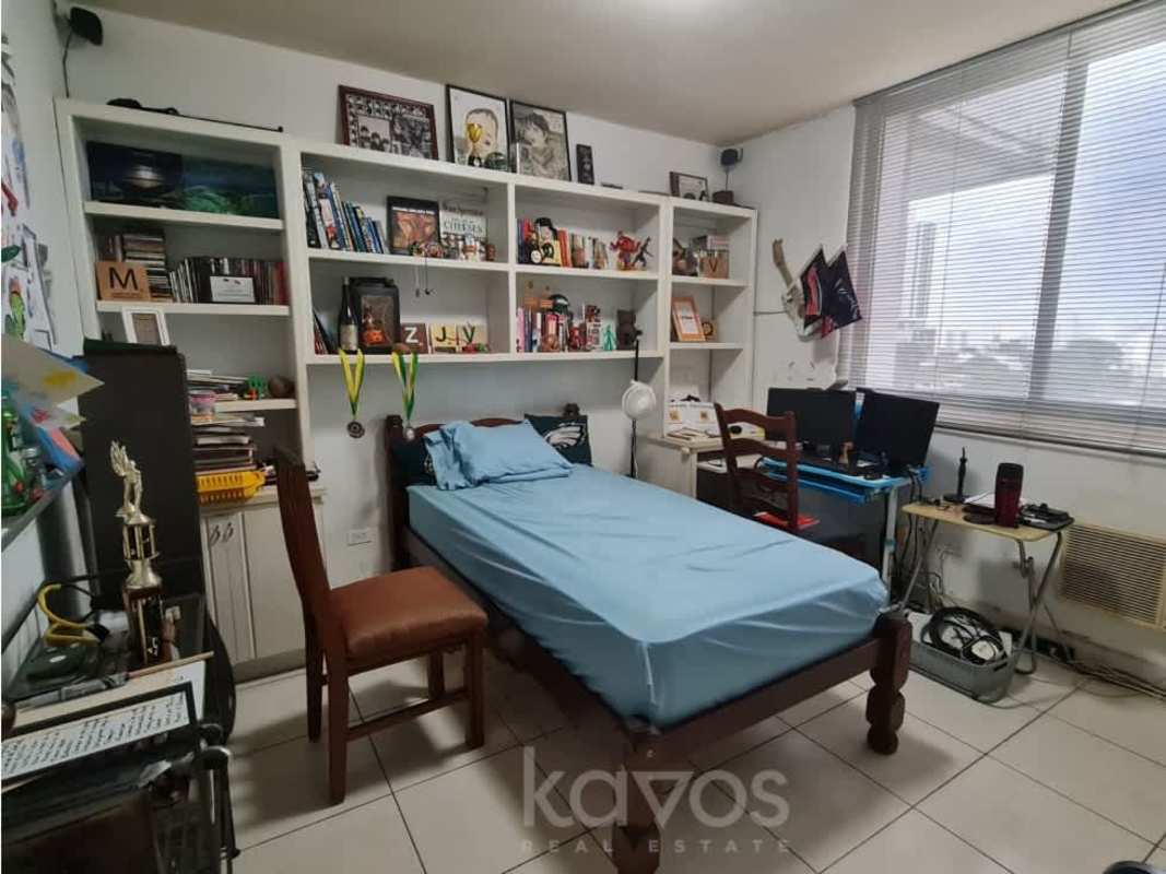 Master bedroom with closet and city view window in PH Paradise Towers Hato Pintado Panama