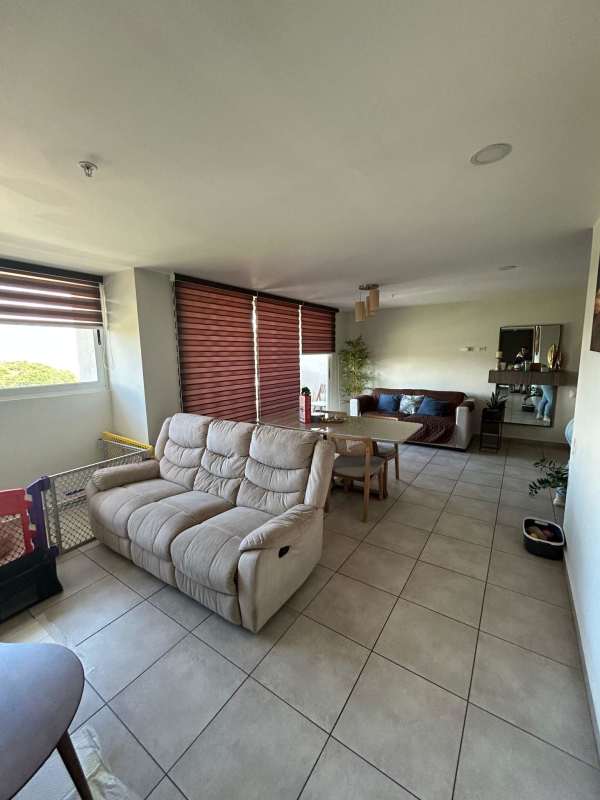 Bedroom with ceramic tile floors closet and natural light in PH Brisas del Golf San Miguelito Panama