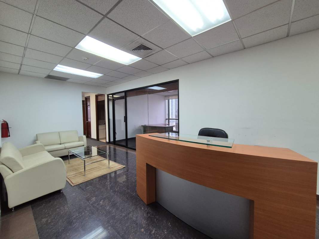 Waiting and reception lobby with sofas, glass partitions, marble floor at Banco General Tower Calle 50 Panama