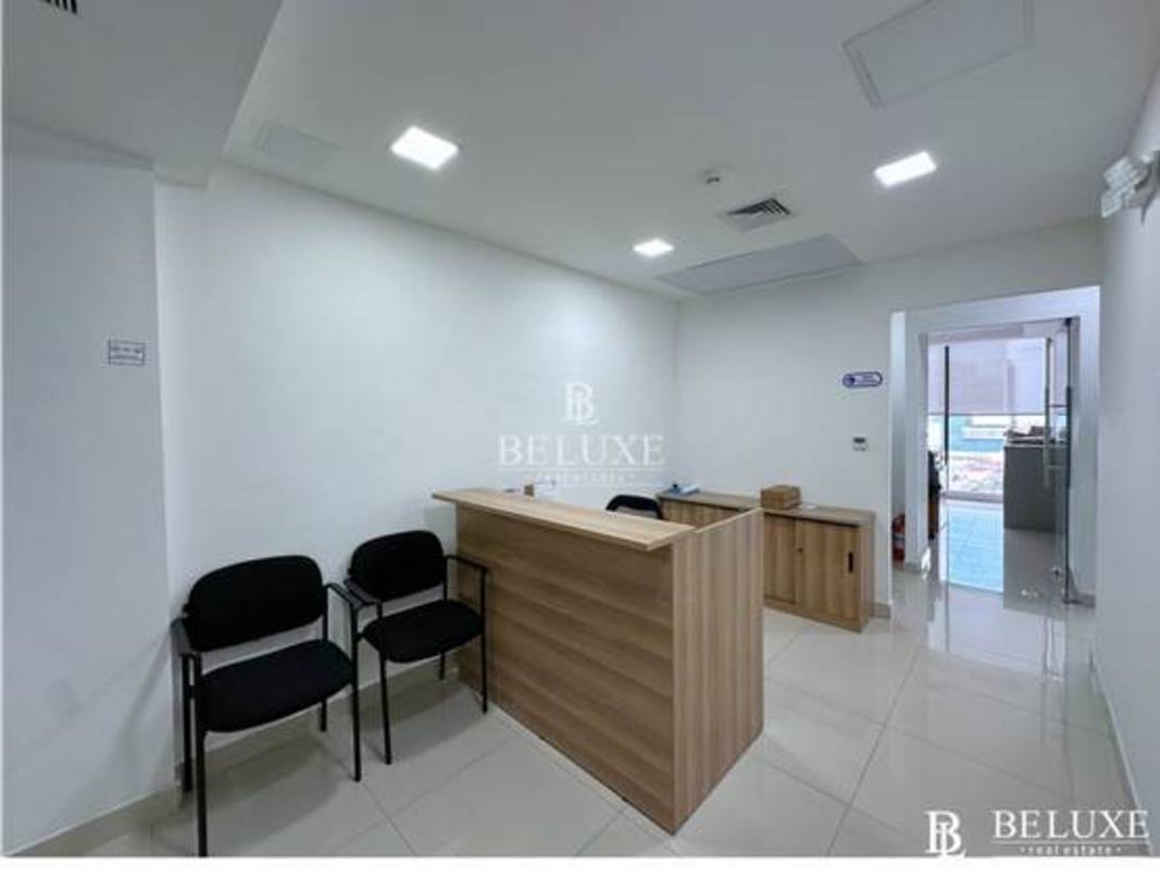 Reception with modern design glass partitions and seating at PH Torre RBS Avenida Balboa Panama