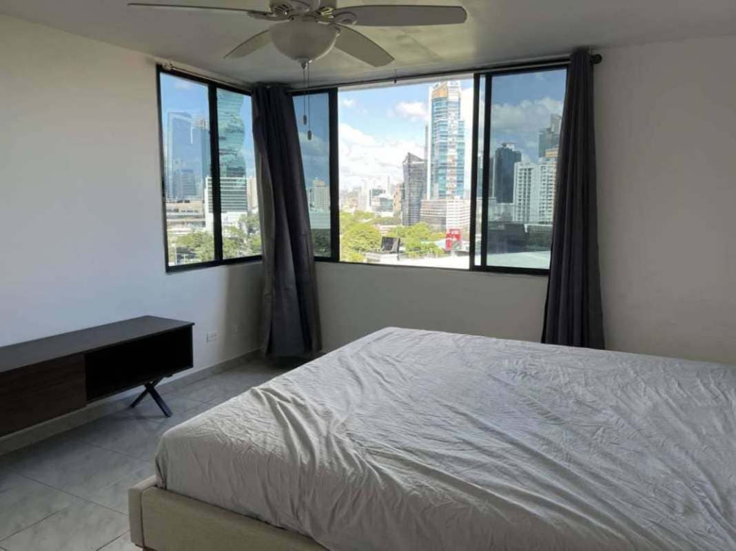 Modern bedroom with large corner windows skyline view PH Miraluz Panama