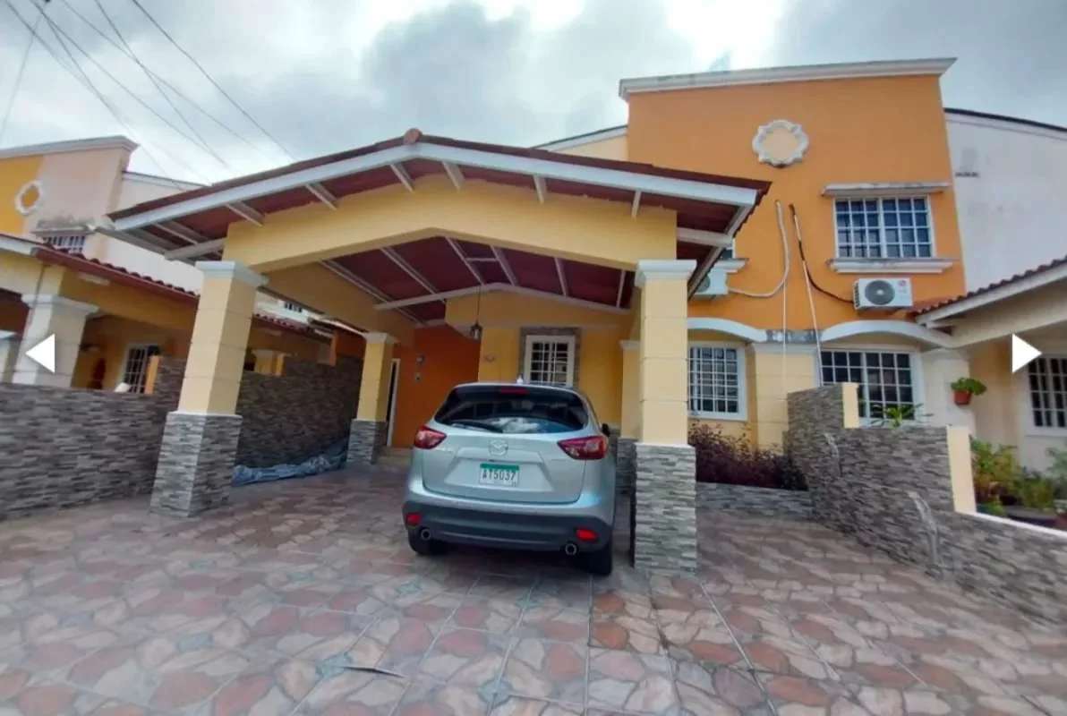Dining space with fan and modern table in Villa Lucre gated community house
