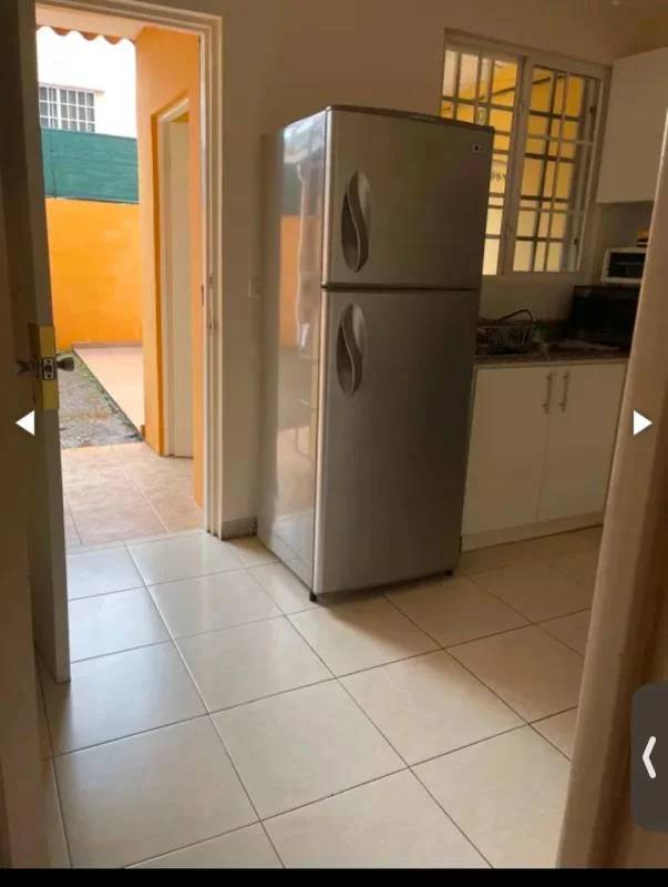 Bedroom with window, AC ready, and space for closet in Villa Lucre house for sale