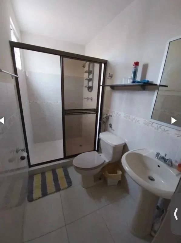 Bedroom with bunk beds, tile floor, and built-in closet in Villa Lucre house Panama