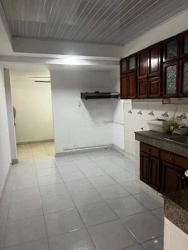Dining space with big windows, wall art, tile floors, security bars La Loceria Panama